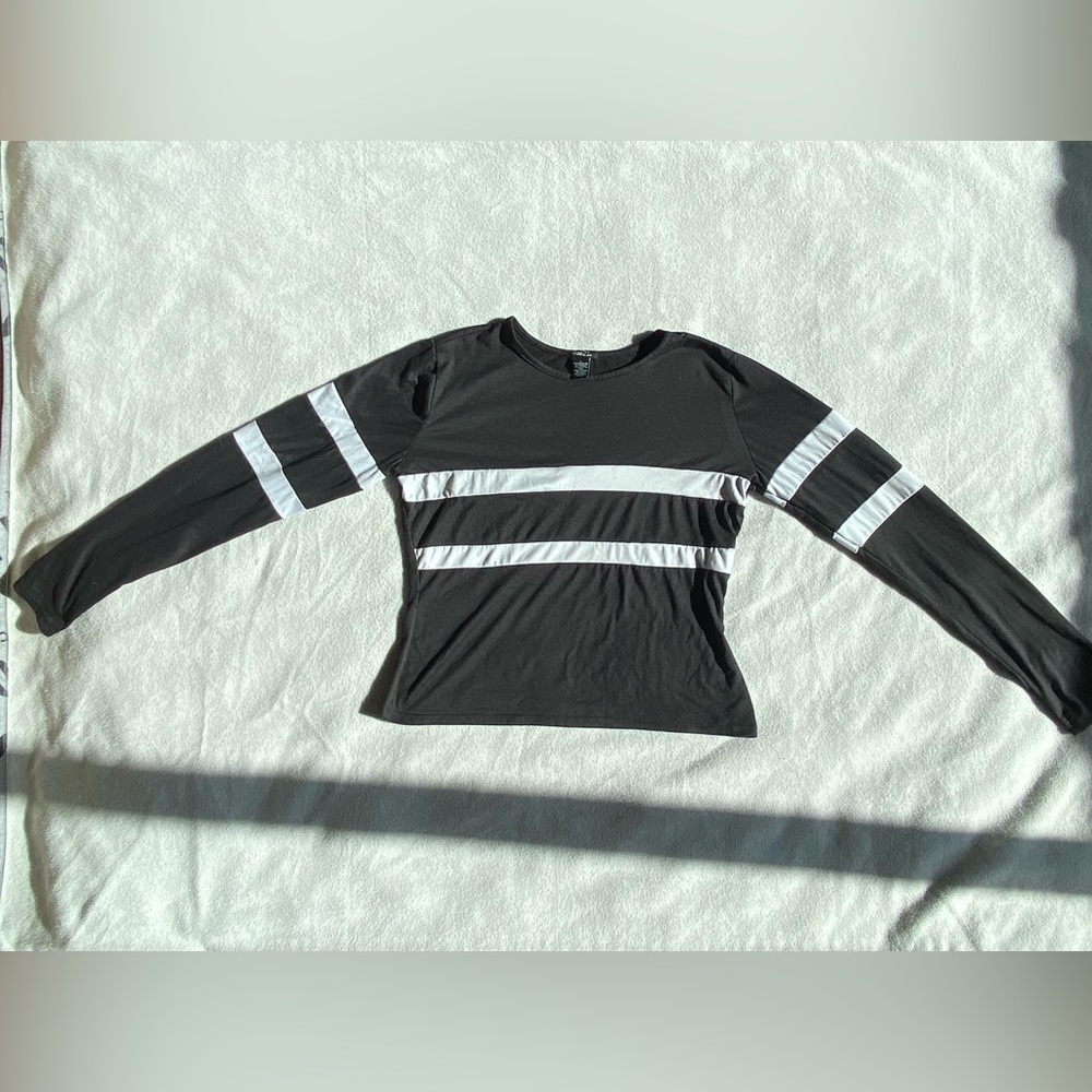 Striped black long sleeve shirt.
